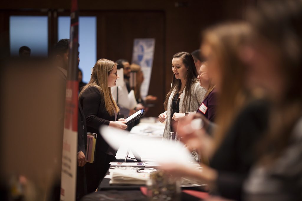 Undergraduate students meet with local businesses in Union South.